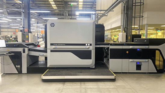 A HP Indigo 100K digital commercial printer in a factory