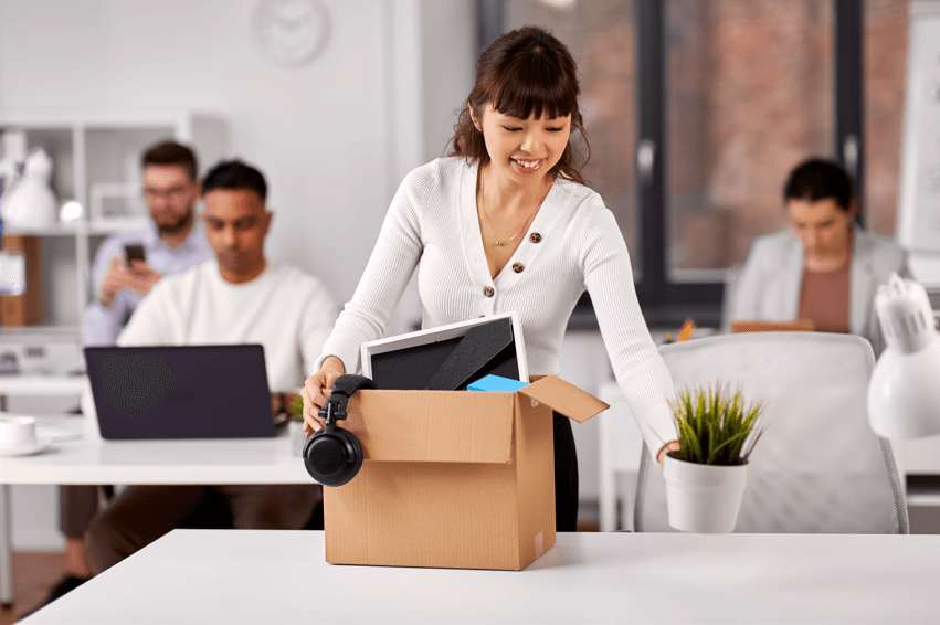 woman packing a box ready to leave her job