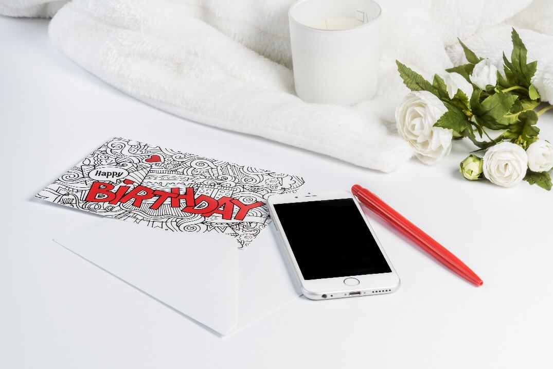 black, white and red illustrated birthday card design