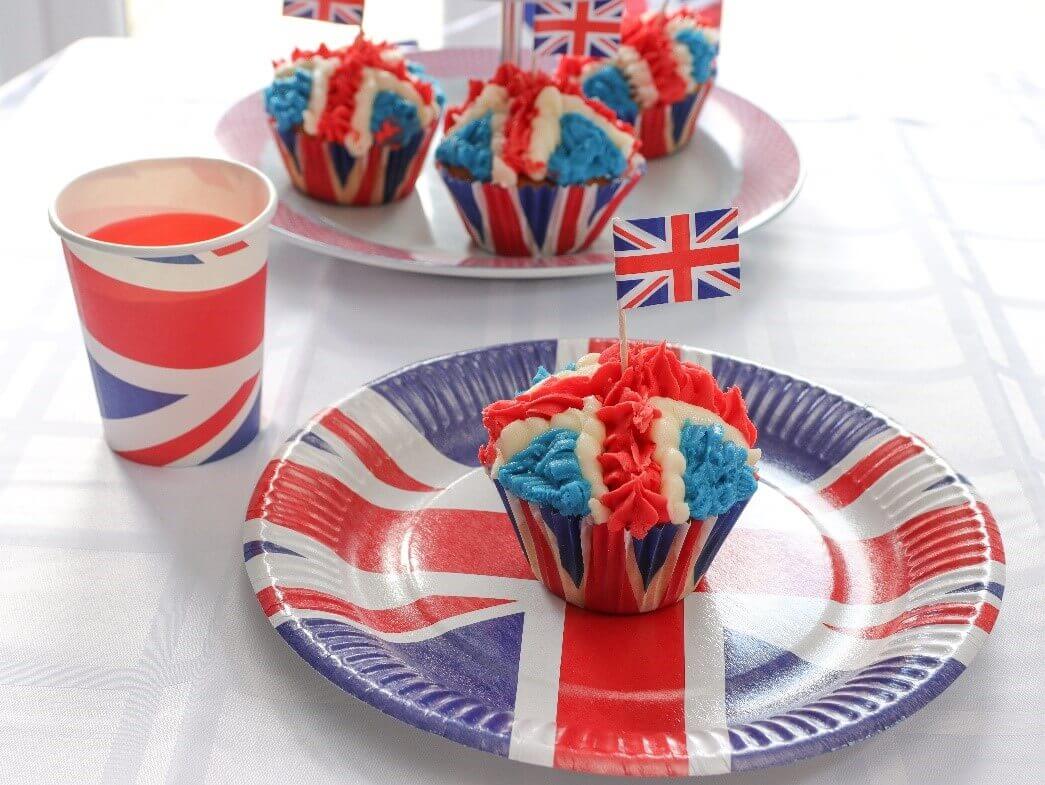 cupcake on a union jack plate with red, blue and white icing