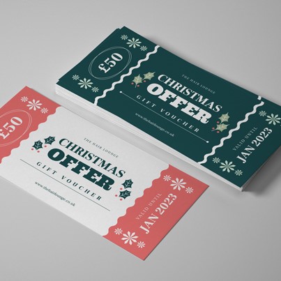 Red, white and green Christmas gift vouchers with a cracker and holly theme