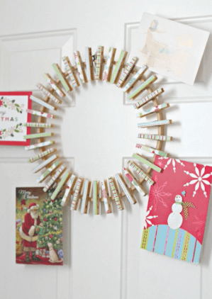 Christmas cards pegged in a circle to create a wreath