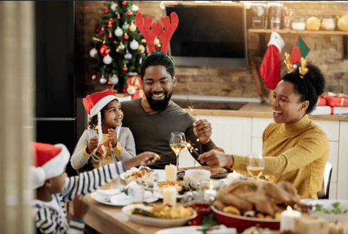 happy family eating a Christmas dinner