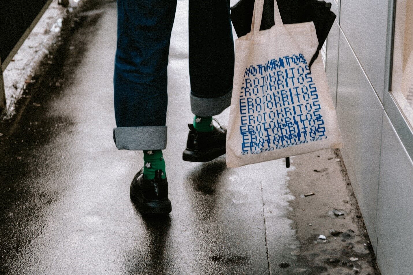 women walking with a graphic printed tote bag