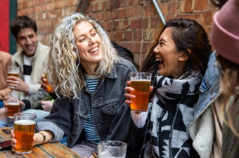 People drinking in the pub