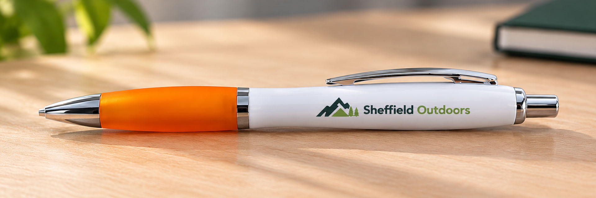 Finished printed pen showing the artwork on the white barrel