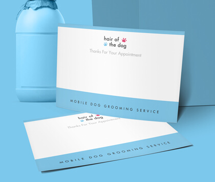 Correspondence Cards stood up against a blue background