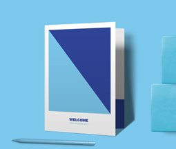Blue Presentation Folder Stood Up on Blue Background