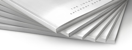 Perfect bound booklets stacked