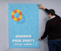 A blue 60 x 40 Poster with a rubber ring in a swimming pool