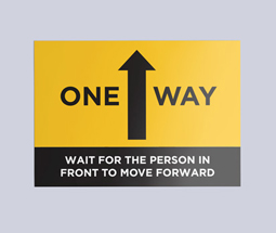 Yellow one way system signs