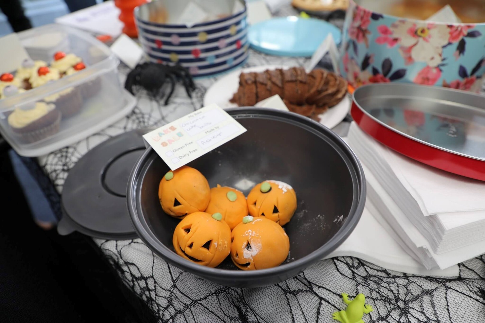 pumpkin treats in a Halloween bake sale