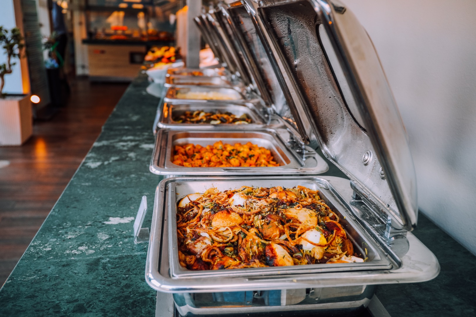 metal containers of food from catering company