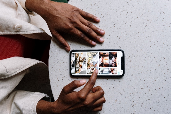 Woman using a smartphone on a countertop